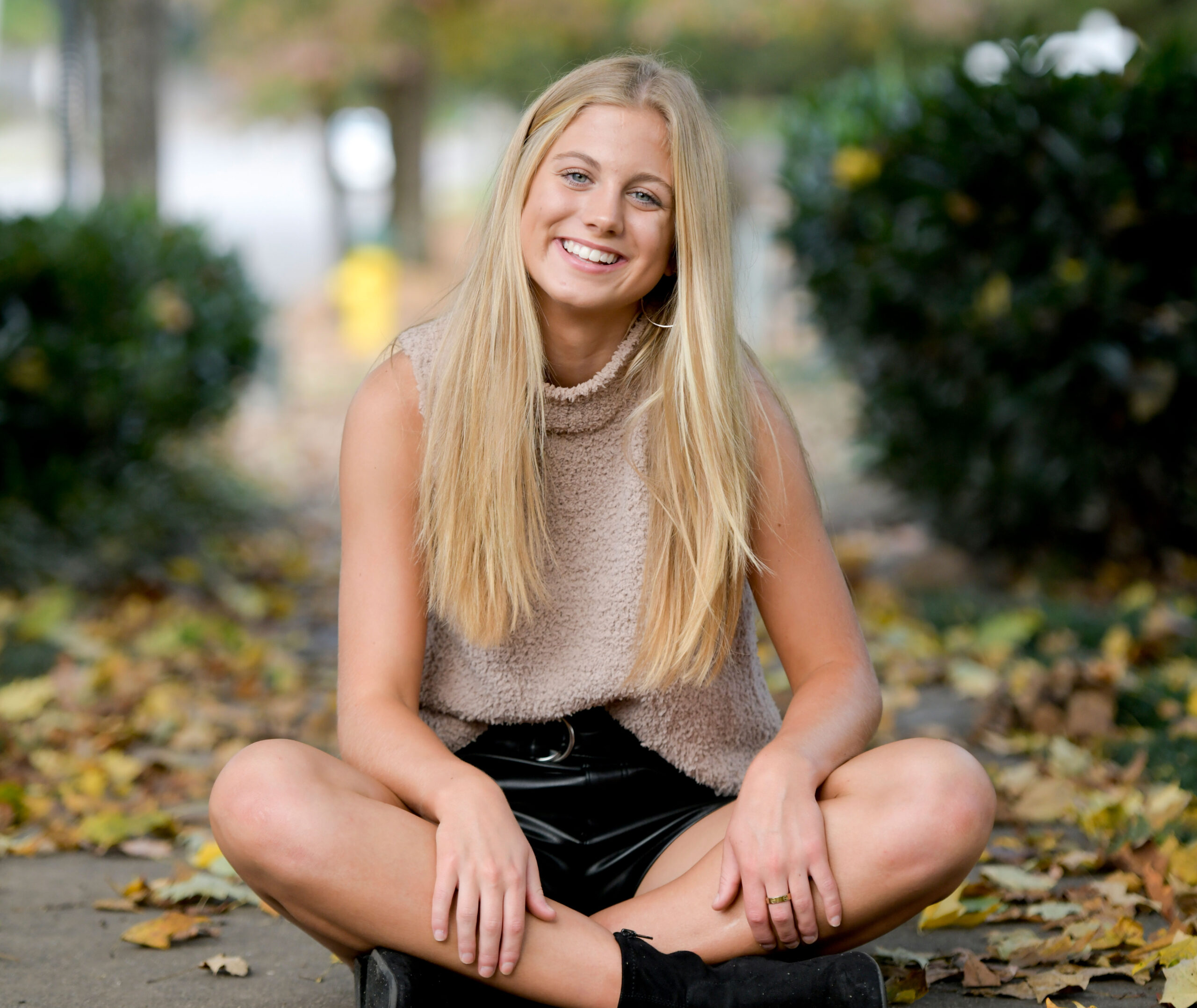 Girls Senior Photos with Fall Leaves in Downtown Huntsville, AL